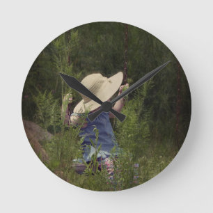 Little Girl on a Swing Round Clock