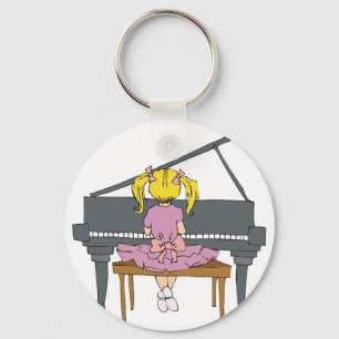 little girl playing piano keychain