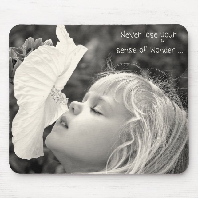 Little girl smelling hibiscus mouse pad (Front)