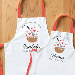Little Helper Family Matching Apron<br><div class="desc">This apron features a graphic of a mixing bowl with a whisk, little red hearts and the saying "made with love". Personalize it by adding your name below the image. This can be paired with a matching mom's apron. Easily edit all text to make it your own. An adorable mommy...</div>