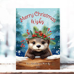 Little Otter Peeking Holly & Pine Merry Christmas Holiday Card<br><div class="desc">This adorable holiday greeting card features a cute Otter illustration wearing a festive crown wreath of winter flowers, holly, pine, and berries, with snowflakes gently falling against a Snowing Winter Forest background. The little Otter is peeking over the snow-capped log to say hello! The playful text "Merry Christmas Wishes" adds...</div>