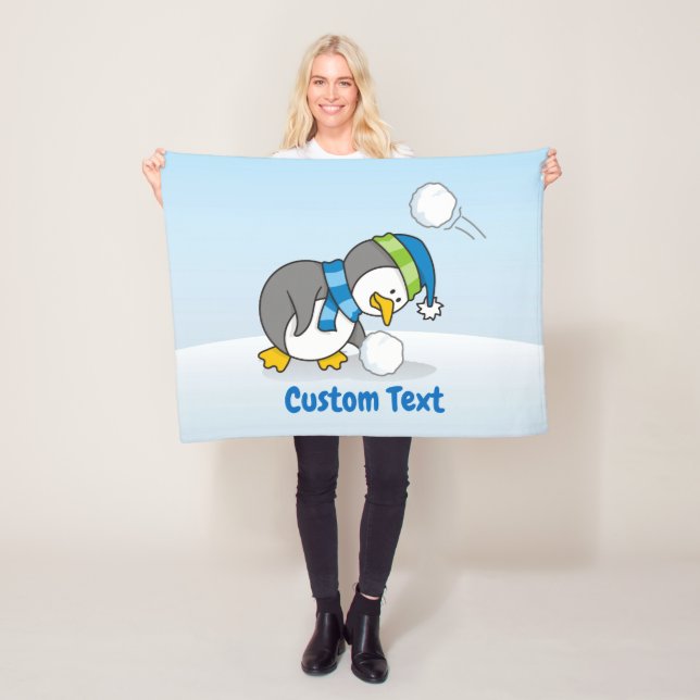 Little penguin getting a snow ball fleece blanket (In Situ)