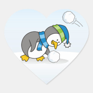 Little penguin getting a snow ball heart sticker