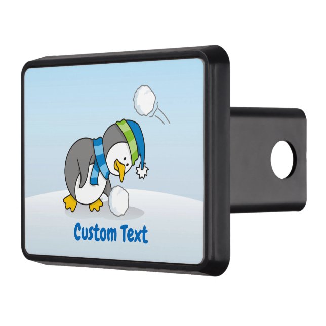 Little penguin getting a snow ball trailer hitch cover (Left)