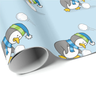 Little penguin getting a snow ball wrapping paper