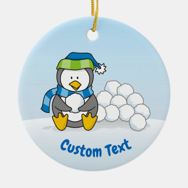 Little penguin sitting with snowballs ceramic ornament (Front)