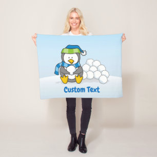 Little penguin sitting with snowballs fleece blank blanket