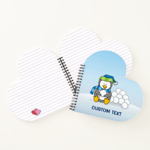 Little penguin sitting with snowballs notebook