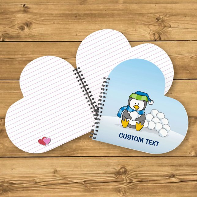 Little penguin sitting with snowballs notebook (Creator Uploaded)