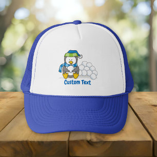 Little penguin sitting with snowballs trucker hat