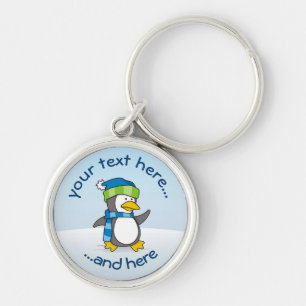 Little penguin walking on snow keychain
