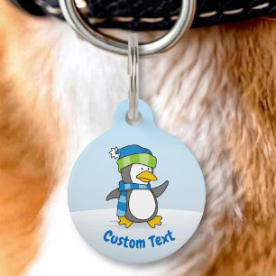Little penguin walking on snow pet tag