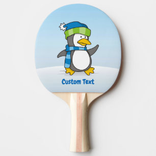 Little penguin walking on snow ping pong paddle
