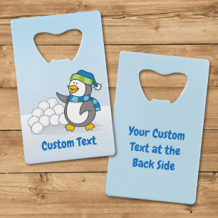 Little penguin with snow balls waving credit card bottle opener