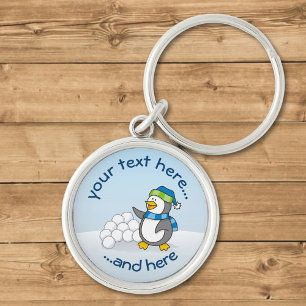 Little penguin with snow balls waving keychain