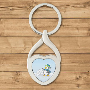 Little penguin with snow balls waving keychain