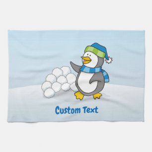 Little penguin with snow balls waving towel