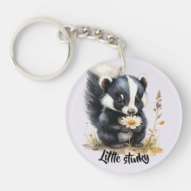 Little skunk sniffing at daisies  keychain (Front)