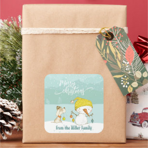 Little snowman and dog in christmas winter scene square sticker