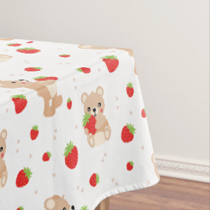 Little teddy bear with berry tablecloth