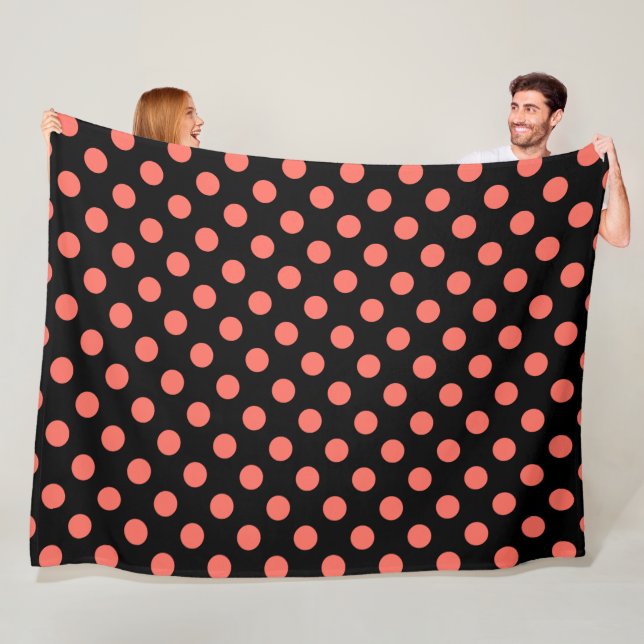 Living coral polka dots on black fleece blanket (In Situ)