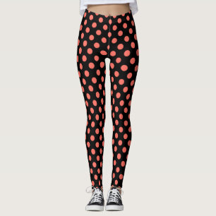 Living coral polka dots on black leggings