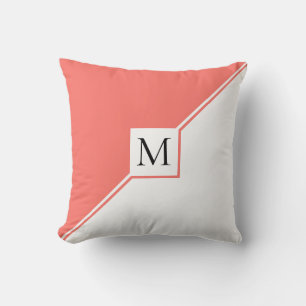 Living coral triangles and monogram modern throw pillow