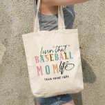 LIVING THAT BASEBALL MOM LIFE TOTE BAG<br><div class="desc">Get ready to show off your baseball mom pride with our delightful bag : an elegant modern font saying "Living that baseball mom life" with calligraphy accents in soft pastel colours. We've left a special space just for your team's name, allowing you to personalize this design and truly make it...</div>