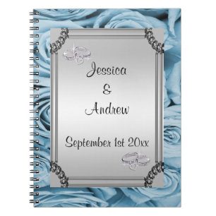 Livre d'invité bleu de roses et d'anneaux de noces