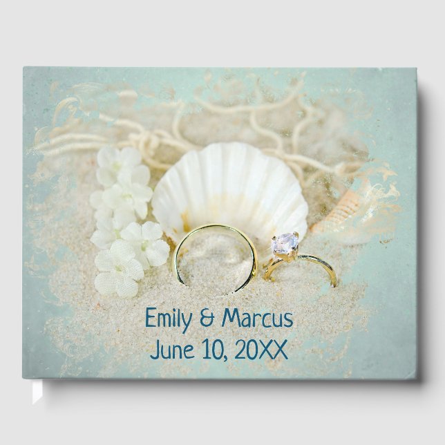 Livre D'or Anneaux mariages et coquillage dans le sable (Recto)