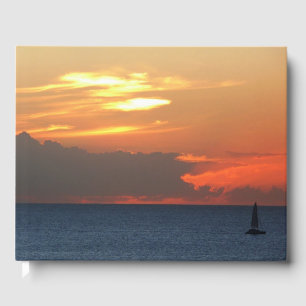 Livre D'or Sunset Clouds and Sailboat Seascape