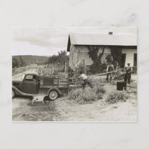 Loading a mower – 1940. postcard
