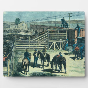 Loading Texas cattle onto a train at Abilene railh Plaque