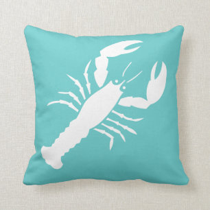 LOBSTER WHITE on teal blue pillow