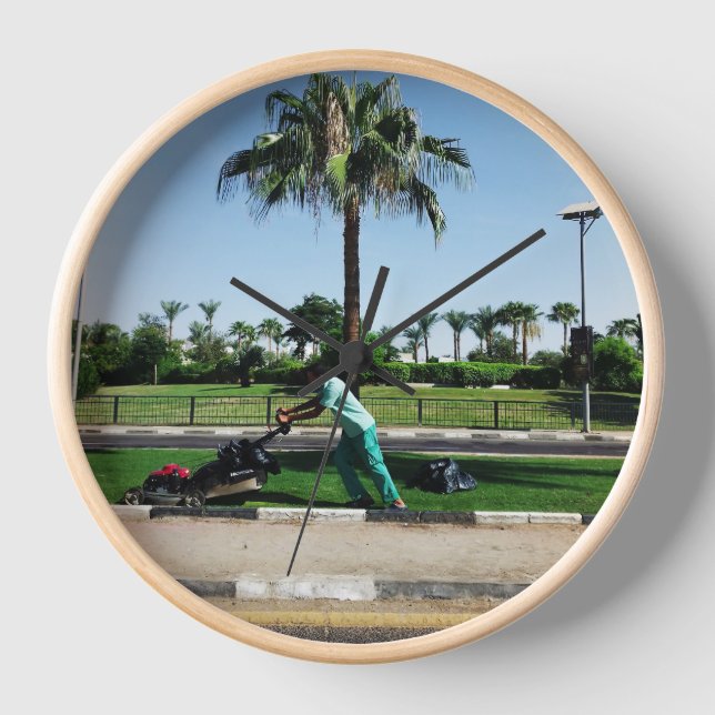 Local resident is engaged in landscaping in Egypt Clock (Front)