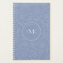 Logo floral bleu TMC