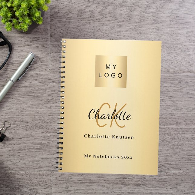 Logo gold monogram modern business notebook (Creator Uploaded)