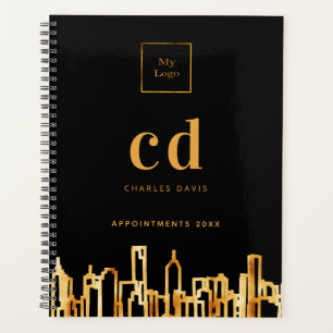 Logo ville or moderne skyline noir affaires 2023