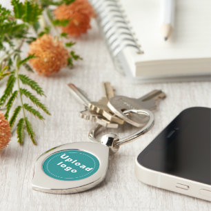 Logo With Teal Green Background on Swirl Metal Keychain