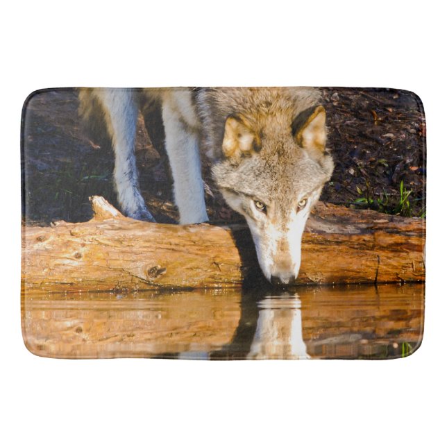 Lone Wolf Reflection in Pond Bath Mat (Front)