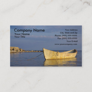 Lonely row boat at sunset business card
