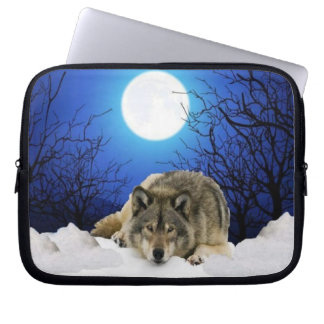 Lonely watcher wolf on a laptop sleeve