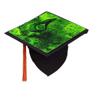 looking to green graduation cap topper