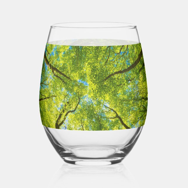 Looking up through green tree leaves stemless wine glass (Left)