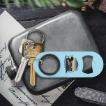 Loon Sunset Blue Keychain Bottle Opener<br><div class="desc">A loon on a lake with a sunset and cattails in a backdrop of blue</div>
