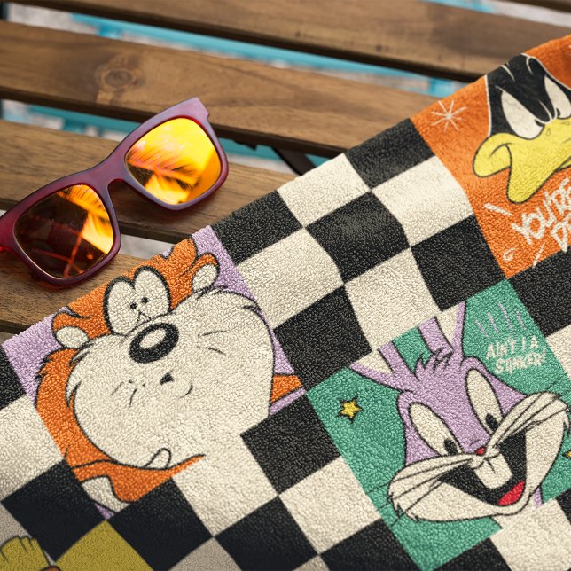 LOONEY TUNES™ Characters on Black & White Chequere Beach Towel (Towel on chair)