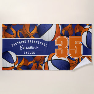 Lots of basketballs with blue orange team colours beach towel