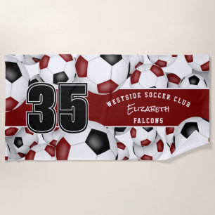 Lots of soccer balls maroon black team colours beach towel