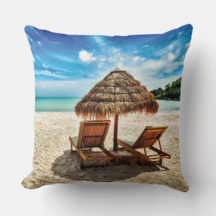 Lounge chairs on beach throw pillow