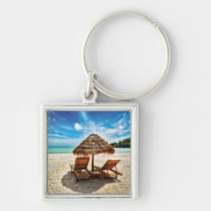 Lounge chairs on beach throw pillow keychain